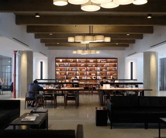 Modern co-working space with desks and chairs Modern co-working space with desks and chairs